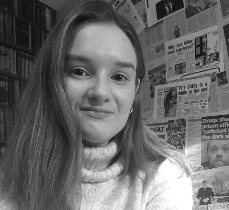 A picture containing text, person

Description automatically generated