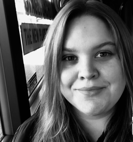 A person taking a selfie

Description automatically generated